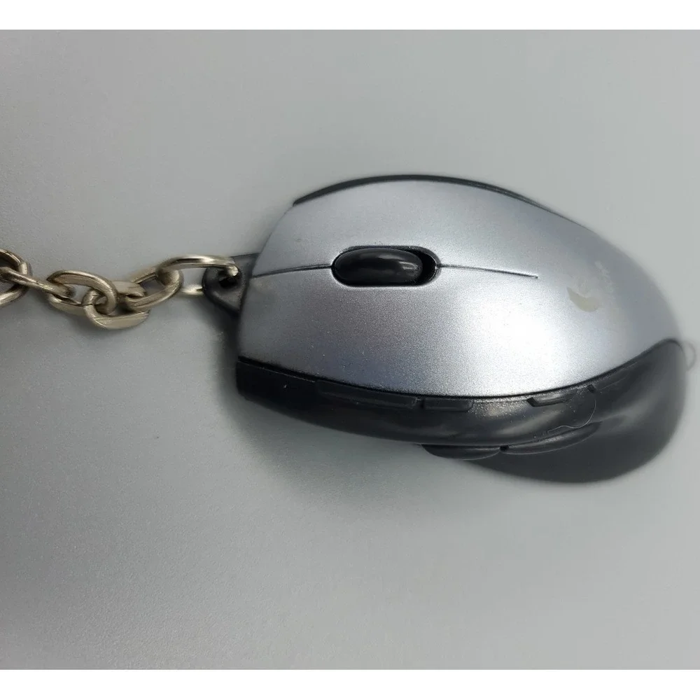 Vintage Logitech‎ Mouse Keychain Light Advert 25th Anniversary Nostalgia